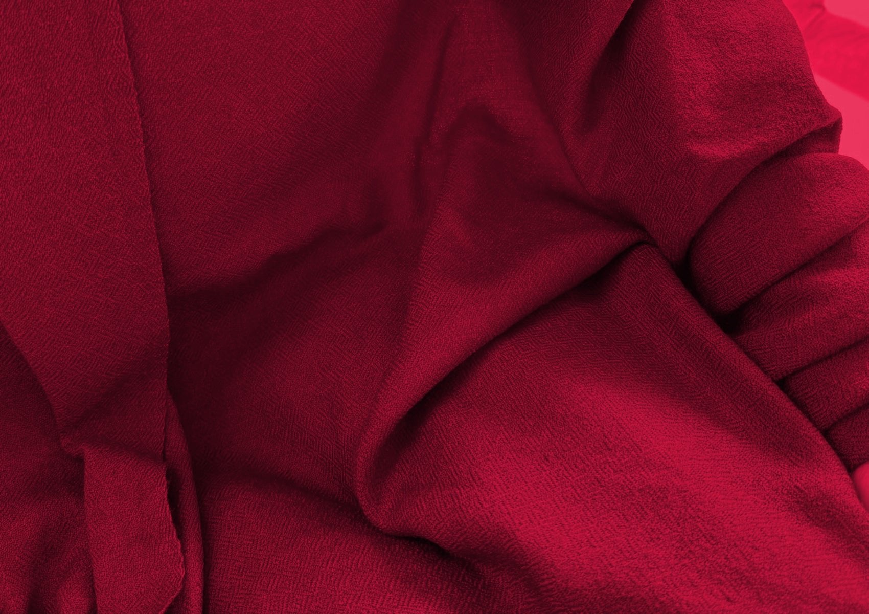 Close-up of the diamond weave texture of the LAMA burgundy lama shawl in fine merino wool.
