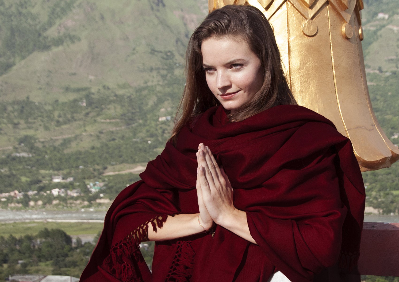 Burgundy classic Buddhist shawl draped gracefully, emphasizing its softness and rich, deep color for meditation.