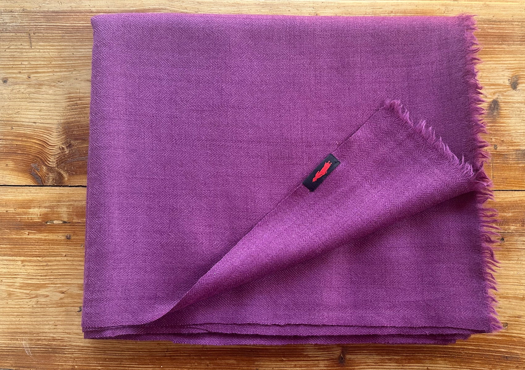 Close-up of the soft merino wool texture of LAMA meditation wrap.
