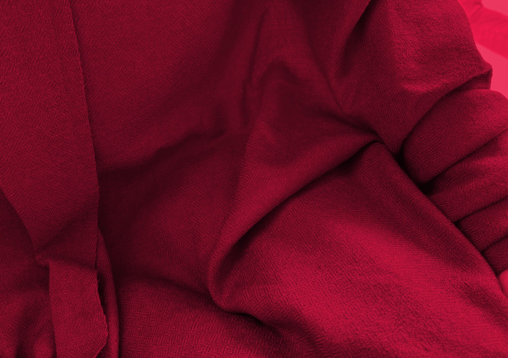 Close-up of the diamond weave texture of the LAMA burgundy lama shawl in fine merino wool.